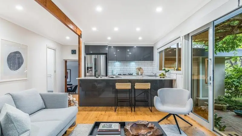 Modern home interior with stylish furniture, layered lighting, and practical upgrades